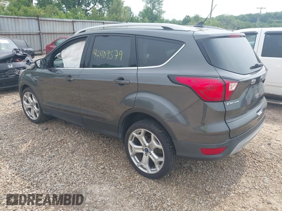 2019 Ford Escape Titanium with VIN 1FMCU0J97KUA34281, listed as a IAAI auction lot 42409579 with 55,400 mi miles and . Bid and sale history available at DreamBid. Image 3.