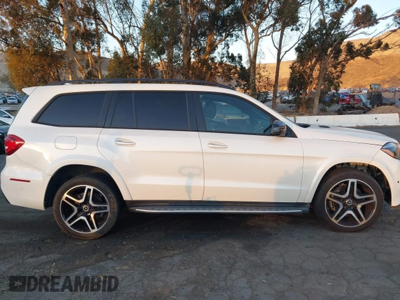 2018 Mercedes-Benz GLS 550 z VIN 4JGDF7DE2JB097282, wystawiony jako IAAI lot #41060046 z przebiegiem 71 317 mil mil oraz . Historia ofert i sprzedaży dostępna na DreamBid. Obrazek 13.