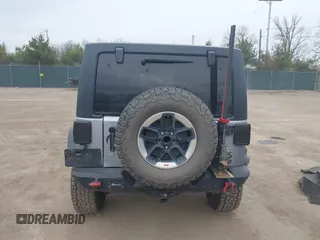 2015 Jeep Wrangler Unlimited Rubicon with VIN 1C4BJWFG1FL546018, listed as a IAAI auction lot 42060045 with 107,249 mi miles and . Bid and sale history available at DreamBid. Image 17.