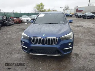 2019 BMW X1 sDrive28i with VIN WBXHU7C5XK5L10933, listed as a IAAI auction lot 41931162 with 55,308 mi miles. Bid and sale history available at carsss.com. Image 12.