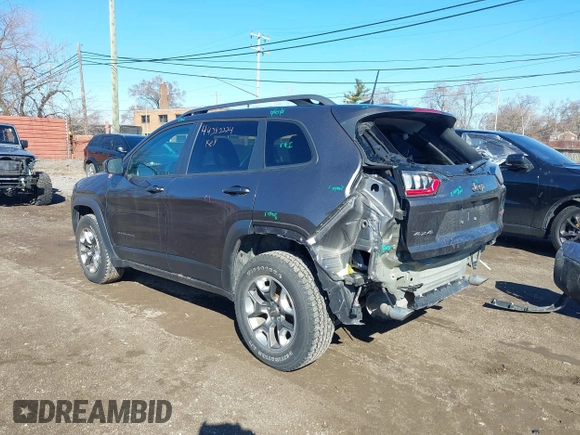 2019 Jeep Cherokee Trailhawk with VIN 1C4PJMBX6KD410391, listed as a IAAI auction lot 41821355 with 79,473 mi miles and . Bid and sale history available at DreamBid. Image 3.