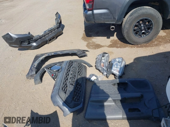 2022 Toyota Tacoma SR with VIN 3TYRX5GN3NT066696, listed as a IAAI auction lot 42514462 with 35,687 mi miles and . Bid and sale history available at DreamBid. Image 12.