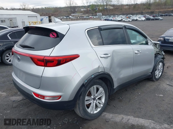 2018 Kia Sportage LX with VIN KNDPMCAC4J7437926, listed as a IAAI auction lot 41968696 with 139,304 mi miles. Bid and sale history available at carsss.com. Image 4.