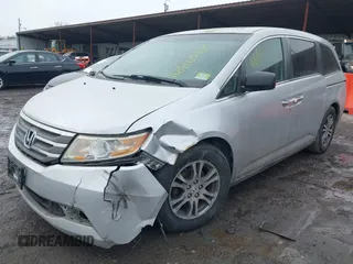 2013 Honda Odyssey EX-L with VIN 5FNRL5H63DB007682, listed as a IAAI auction lot 41408103 with 201,453 mi miles and . Bid and sale history available at carsss.com. Image 2.