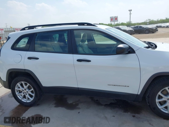 2015 Jeep Cherokee Sport with VIN 1C4PJLAB6FW602355, listed as a IAAI auction lot 41962707 with 175,428 mi miles. Bid and sale history available at carsss.com. Image 14.