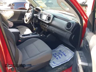 2018 Toyota Tacoma SR with VIN 5TFCZ5AN7JX163344, listed as a IAAI auction lot 40008984 with 93,598 mi miles. Bid and sale history available at carsss.com. Image 5.