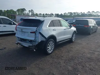 2023 Cadillac XT4 FWD Luxury with VIN 1GYAZAR48PF205055, listed as a IAAI auction lot 41915442 with 42,652 mi miles. Bid and sale history available at carsss.com. Image 4.