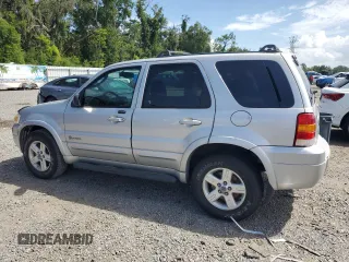 2006 Ford Escape Hybrid z VIN 1FMCU96H36KA35403, wystawiony jako Copart lot #65374705 z przebiegiem 127 689 mil mil oraz Czysty tytuł • Clean title. Historia ofert i sprzedaży dostępna na DreamBid. Obrazek 2.