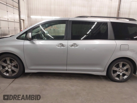 2015 Toyota Sienna SE with VIN 5TDXK3DC9FS527667, listed as a IAAI auction lot 41977729 with 230,933 mi miles and . Bid and sale history available at DreamBid. Image 15.