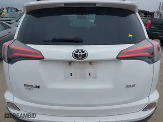 2016 Toyota RAV4 XLE with VIN 2T3WFREV8GW259777, listed as a IAAI auction lot 41241266 with 129,122 mi miles. Bid and sale history available at carsss.com. Image 16.