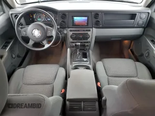 2007 Jeep Commander Sport z VIN 1J8HG48P97C622153, wystawiony jako Copart lot #50291165 z przebiegiem 113 516 mil mil oraz Szkoda całkowita • Salvage title. Historia ofert i sprzedaży dostępna na DreamBid. Obrazek 8.