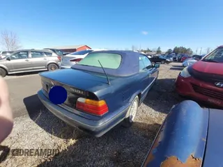 1995 BMW 3 Series 318iC with VIN WBABK6328SED18313, listed as a Copart auction lot 51153305 with 285,000 mi miles and Salvage Title. Bid and sale history available at carsss.com. Image 4.