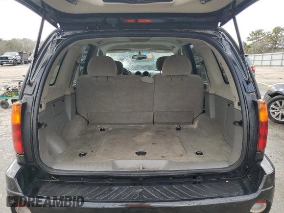 2006 GMC Envoy SLT with VIN 1GKDS13S762258032, listed as a Copart auction lot 88677095 with 184,188 mi miles and Salvage Title. Bid and sale history available at carsss.com. Image 6.