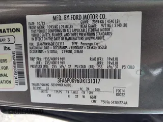 2013 Ford Fusion Titanium with VIN 3FA6P0K96DR131317, listed as a IAAI auction lot 42552736 with 154,762 mi miles and . Bid and sale history available at DreamBid. Image 9.