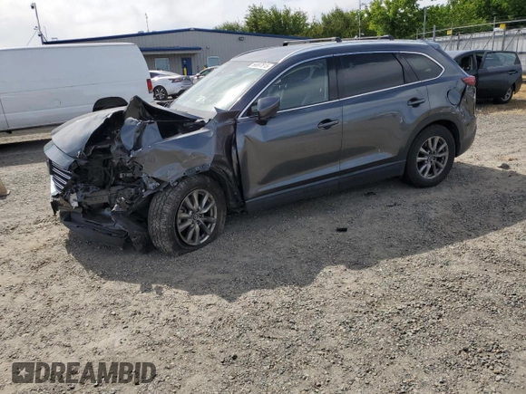 2019 Mazda CX-9 Touring with VIN JM3TCBCY0K0309947, listed as a Copart auction lot 56897815 with 87,517 mi miles and Salvage title. Bid and sale history available at DreamBid. Image 1.