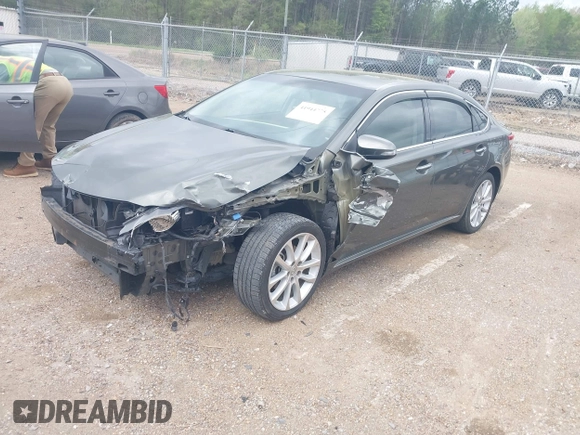 2013 Toyota Avalon XLE with VIN 4T1BK1EBXDU067394, listed as a IAAI auction lot 41944775 with 146,216 mi miles and . Bid and sale history available at DreamBid. Image 2.