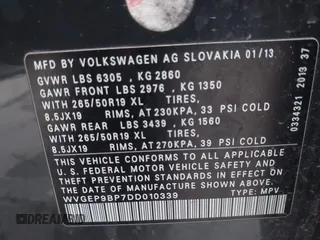 2013 Volkswagen Touareg Exec z VIN WVGEP9BP7DD010339, wystawiony jako IAAI lot #41094662 z przebiegiem 91 280 mil mil oraz . Historia ofert i sprzedaży dostępna na DreamBid. Obrazek 9.
