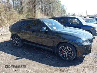 2022 BMW X4 M40i with VIN 5UX43DT04N9K92572, listed as a IAAI auction lot 41985086 with 64,743 mi miles and . Bid and sale history available at DreamBid. Image 13.