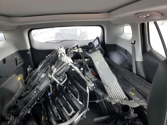 2023 GMC Terrain SLT z VIN 3GKALPEG1PL218329, wystawiony jako Copart lot #57949405 z przebiegiem 25 299 mil mil oraz Szkoda całkowita • Salvage title. Historia ofert i sprzedaży dostępna na DreamBid. Obrazek 10.