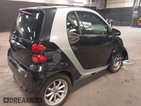 2010 Smart fortwo Pure with VIN WMEEJ3BA7AK402342, listed as a IAAI auction lot 42417829 with 38,225 mi miles and . Bid and sale history available at DreamBid. Image 4.