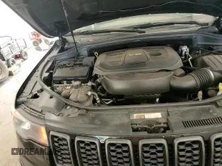 2019 Jeep Grand Cherokee Trailhawk with VIN 1C4RJFLG8KC613582, listed as a Copart auction lot 56102795 with 136,809 mi miles and Salvage title. Bid and sale history available at DreamBid. Image 14.