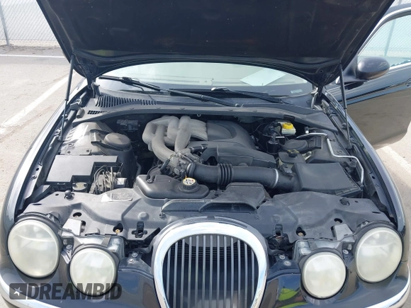 2003 Jaguar S-Type with VIN SAJEA01T93FM64497, listed as a IAAI auction lot 41804705 with 224,978 mi miles and . Bid and sale history available at DreamBid. Image 10.