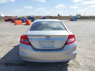 2012 Honda Civic Cpe LX with VIN 2HGFG3B52CH549698, listed as a IAAI auction lot 41818647 with 100,975 mi miles. Bid and sale history available at carsss.com. Image 16.