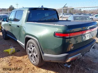 2022 Rivian R1T Adventure Package with VIN 7FCTGAAA2NN006098, listed as a IAAI auction lot 41172815 with 1 mi miles. Bid and sale history available at carsss.com. Image 3.