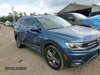 2020 Volkswagen Tiguan SE z VIN 3VV3B7AXXLM124257, wystawiony jako Copart lot #53740795 z przebiegiem 63 455 mil mil oraz Szkoda całkowita • Salvage title. Historia ofert i sprzedaży dostępna na DreamBid. Obrazek 14.