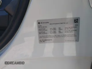 2025 Rivian R1S Adventure with VIN 7PDSGBBA0SN049154, listed as a IAAI auction lot 41160166 with 3,036 mi miles. Bid and sale history available at carsss.com. Image 9.