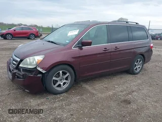 2007 Honda Odyssey Touring with VIN 5FNRL38847B048235, listed as a IAAI auction lot 41963652 with 176,412 mi miles. Bid and sale history available at carsss.com. Image 19.
