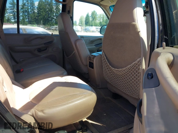 1999 Ford Expedition XLT z VIN 1FMPU18L9XLC40031, wystawiony jako IAAI lot #42722263 z przebiegiem 168 395 mil mil oraz . Historia ofert i sprzedaży dostępna na DreamBid. Obrazek 8.