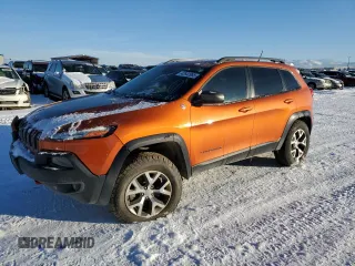 2015 Jeep Cherokee Trailhawk z VIN 1C4PJMBS5FW521402, wystawiony jako Copart lot #42642965 z przebiegiem 79 506 mil mil oraz Szkoda całkowita • Salvage title. Historia ofert i sprzedaży dostępna na DreamBid. Obrazek 1.