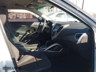 2015 Hyundai Veloster with VIN KMHTC6AD3FU227852, listed as a IAAI auction lot 41657406 with 179,185 mi miles. Bid and sale history available at carsss.com. Image 5.