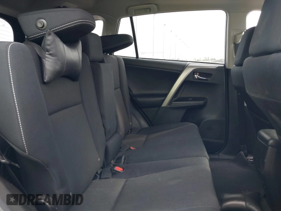 2018 Toyota RAV4 XLE with VIN 2T3WFREV4JW417555, listed as a IAAI auction lot 41092589 with 93,788 mi miles and . Bid and sale history available at DreamBid. Image 8.