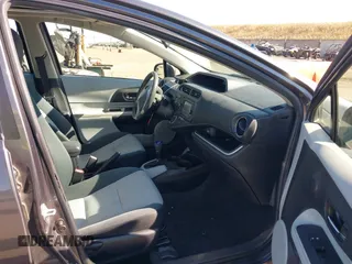 2014 Toyota Prius One z VIN JTDKDTB39E1078879, wystawiony jako IAAI lot #42201010 z przebiegiem 147 544 mil mil oraz . Historia ofert i sprzedaży dostępna na DreamBid. Obrazek 5.