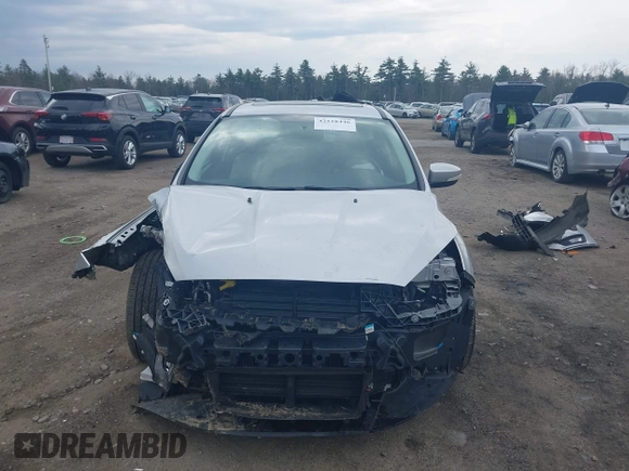 2018 Ford Focus Titanium с VIN 1FADP3N23JL279460, выставлен на аукционе IAAI как лот 42118446 с пробегом 156 309 миль миль и . История ставок и продаж доступна на DreamBid. Изображение 13.