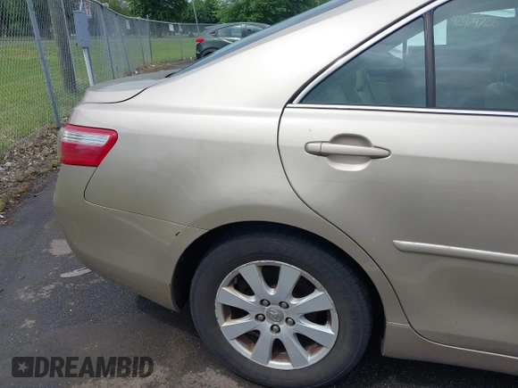 2009 Toyota Camry LE z VIN 4T1BK46KX9U089242, wystawiony jako IAAI lot #42448998 z przebiegiem 252 787 mil mil oraz . Historia ofert i sprzedaży dostępna na DreamBid. Obrazek 15.