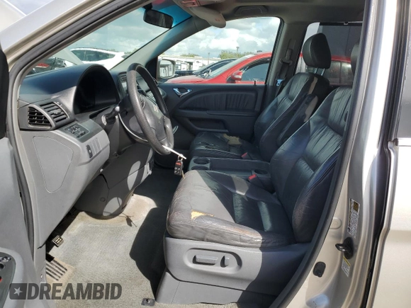 2005 Honda Odyssey EX-L z VIN 5FNRL38655B408107, wystawiony jako Copart lot #50918155 z przebiegiem 215 920 mil mil oraz Szkoda całkowita • Salvage title. Historia ofert i sprzedaży dostępna na DreamBid. Obrazek 7.