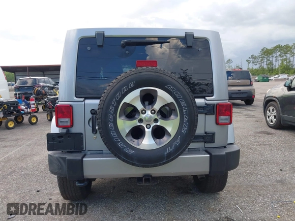 2016 Jeep Wrangler Unlimited Sahara with VIN 1C4BJWEG3GL240859, listed as a IAAI auction lot 42628937 with 103,378 mi miles and . Bid and sale history available at DreamBid. Image 16.
