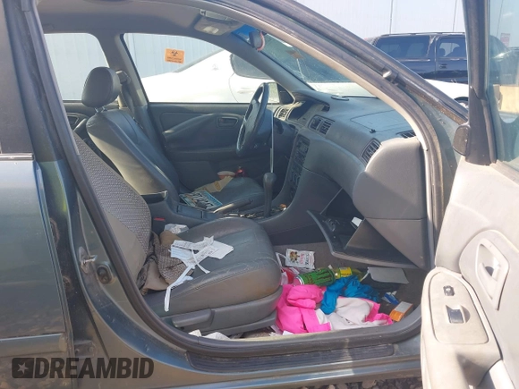 2000 Toyota Camry CE z VIN JT2BG22K5Y0476098, wystawiony jako IAAI lot #42200385 z przebiegiem Nie podano mil oraz . Historia ofert i sprzedaży dostępna na DreamBid. Obrazek 5.