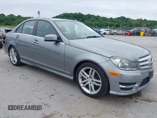 2014 Mercedes-Benz C 250 Sport with VIN WDDGF4HB6EG160494, listed as a IAAI auction lot 42310423 with 145,160 mi miles and . Bid and sale history available at DreamBid. Image 1.