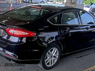 2016 Ford Fusion SE with VIN 3FA6P0H75GR318851, listed as a IAAI auction lot 42853126 with 59,063 mi miles and . Bid and sale history available at DreamBid. Image 16.