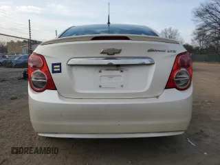 2014 Chevrolet Sonic LTZ with VIN 1G1JE5SH4E4132029, listed as a Copart auction lot 45450305 with 115,173 mi miles and Clean Title. Bid and sale history available at carsss.com. Image 6.