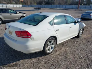 2013 Volkswagen Passat SE w/Sunroof with VIN 1VWBH7A31DC007320, listed as a IAAI auction lot 41213664 with 164,040 mi miles. Bid and sale history available at carsss.com. Image 4.