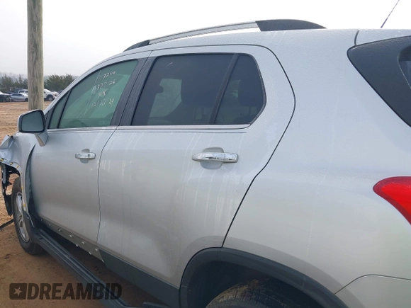 2019 Chevrolet Trax LT z VIN KL7CJLSBXKB917249, wystawiony jako IAAI lot #41225281 z przebiegiem 113 842 mil mil oraz . Historia ofert i sprzedaży dostępna na DreamBid. Obrazek 13.