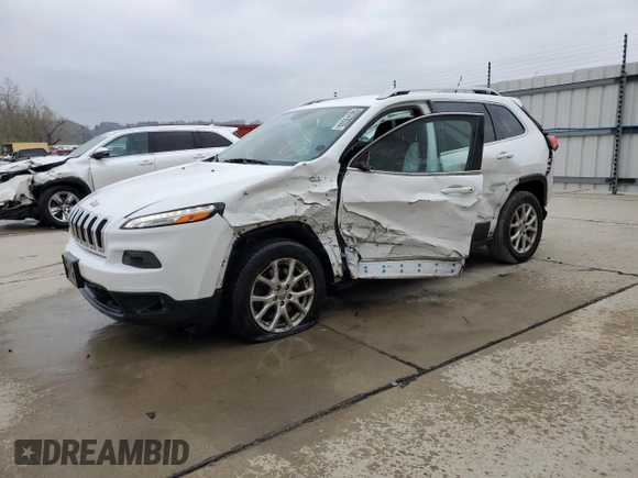 2015 Jeep Cherokee Latitude with VIN 1C4PJLCB9FW532301, listed as a Copart auction lot 52379335 with 153,845 mi miles and Salvage Title. Bid and sale history available at DreamBid. Image 1.