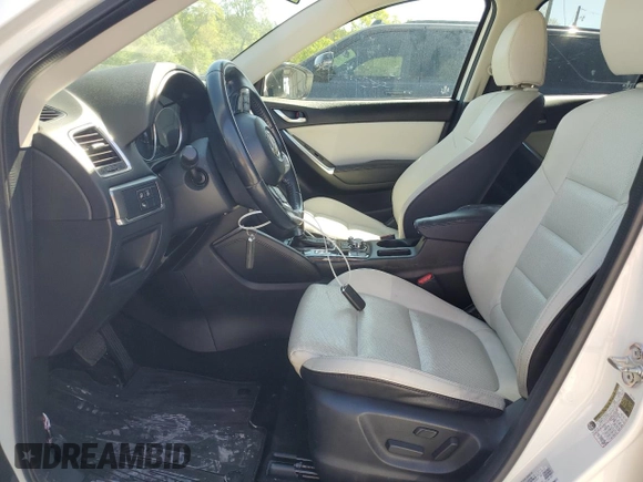 2016 Mazda CX-5 Grand Touring with VIN JM3KE4DY0G0819528, listed as a Copart auction lot 52343885 with 77,340 mi miles and Clean Title. Bid and sale history available at DreamBid. Image 7.