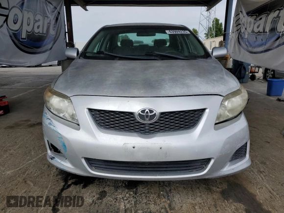 2010 Toyota Corolla with VIN 1NXBU4EE8AZ187793, listed as a Copart auction lot 63909235 with 65,164 mi miles and Salvage title. Bid and sale history available at DreamBid. Image 5.