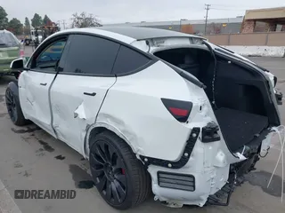 2022 Tesla Model Y Performance z VIN 7SAYGDEFXNF484838, wystawiony jako IAAI lot #41392095 z przebiegiem 8 728 mil mil oraz . Historia ofert i sprzedaży dostępna na DreamBid. Obrazek 6.